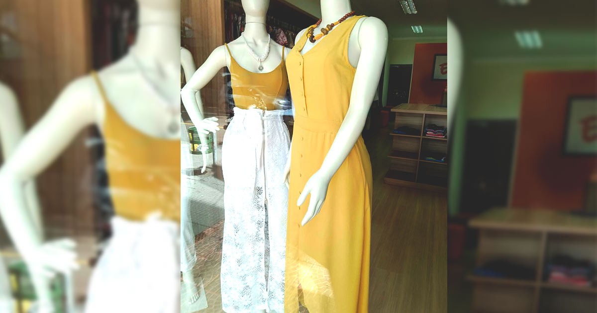 Roupas brancas e amarelas são maioria nas vitrines do comércio